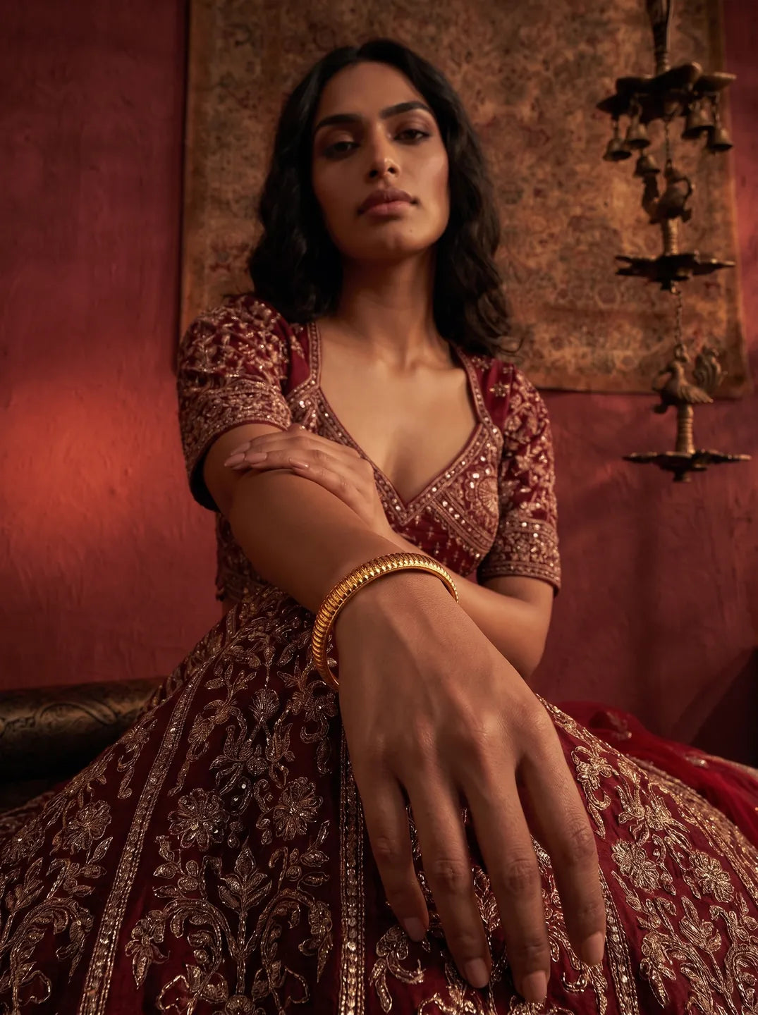 Rema bangles worn with a bridal lehenga